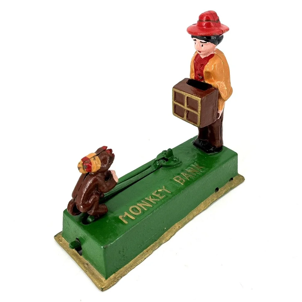 ORGAN GRINDER MONKEY BANK Cast Iron Works Great‎